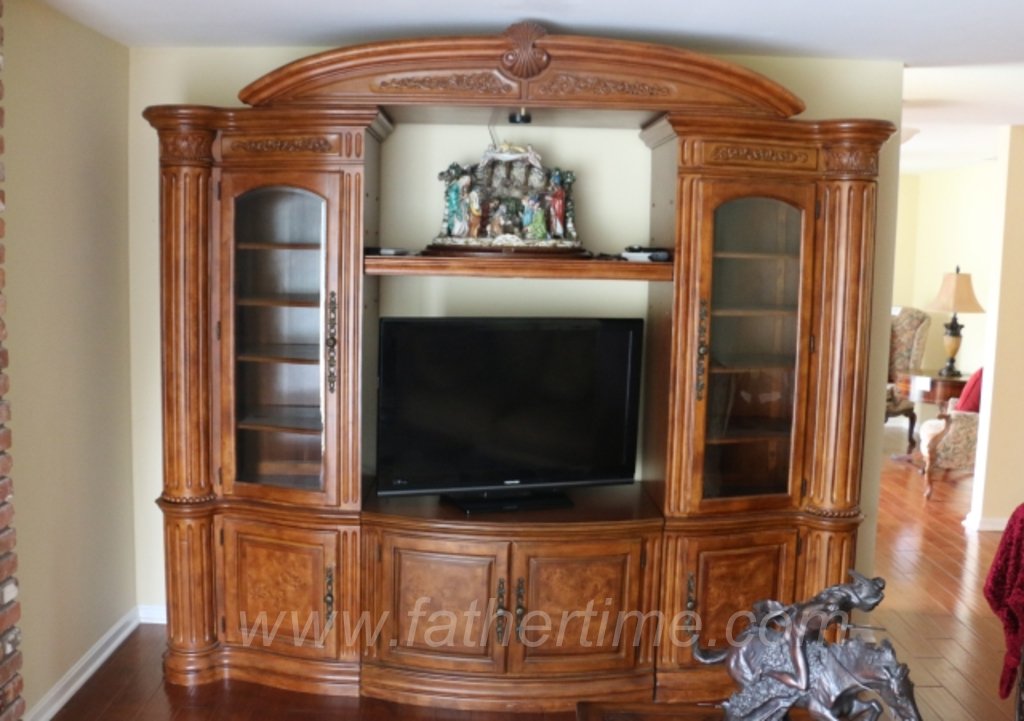 Father Time Auctions, Entertainment cabinet with 5 separate sections. Beautifully crafted with rich hard woods / burled wood doors / beveled glass door inserts and bronze antique style hardware.